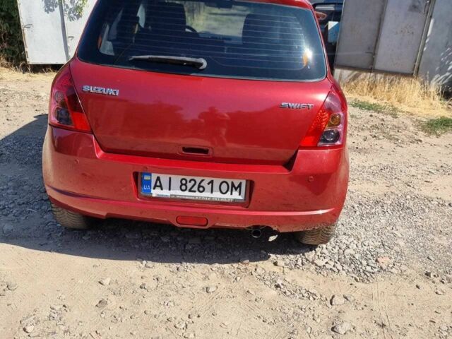 Червоний Сузукі Свифт, об'ємом двигуна 1.3 л та пробігом 166 тис. км за 4399 $, фото 11 на Automoto.ua
