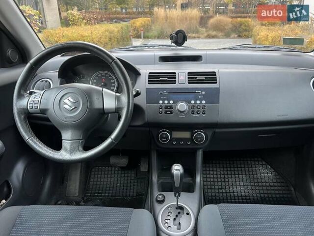 Красный Сузуки Свифт, объемом двигателя 1.49 л и пробегом 169 тыс. км за 6950 $, фото 30 на Automoto.ua