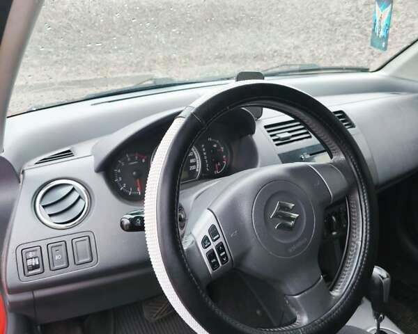 Червоний Сузукі Свифт, об'ємом двигуна 1.49 л та пробігом 220 тис. км за 6100 $, фото 6 на Automoto.ua