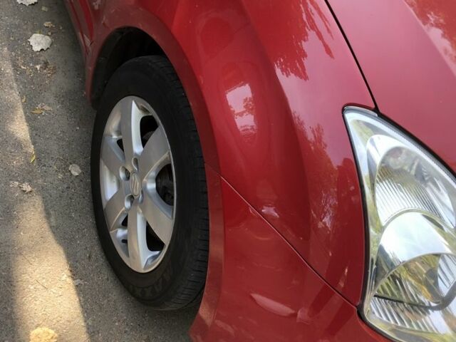 Красный Сузуки Свифт, объемом двигателя 1.3 л и пробегом 202 тыс. км за 5500 $, фото 4 на Automoto.ua