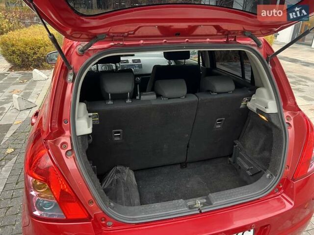 Красный Сузуки Свифт, объемом двигателя 1.49 л и пробегом 169 тыс. км за 6950 $, фото 21 на Automoto.ua