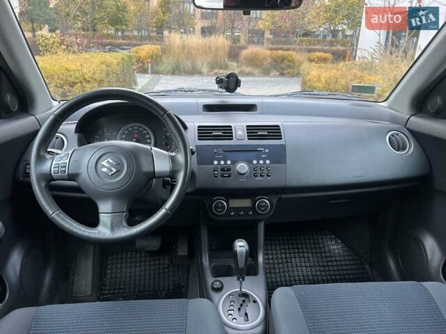 Красный Сузуки Свифт, объемом двигателя 1.49 л и пробегом 169 тыс. км за 6950 $, фото 27 на Automoto.ua