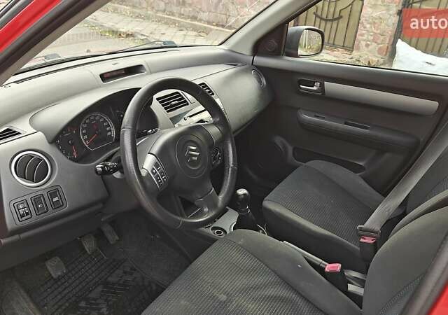Сузуки Свифт 2010 в Киеве на Automoto.ua Красный Сузуки Свифт, объемом двигателя 1.33 л и пробегом 198 тыс. км за 4100 $, фото 13 на Automoto.ua