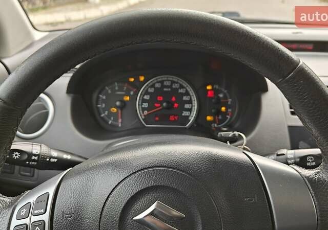 Сузуки Свифт 2010 в Киеве на Automoto.ua Красный Сузуки Свифт, объемом двигателя 1.33 л и пробегом 198 тыс. км за 4100 $, фото 14 на Automoto.ua