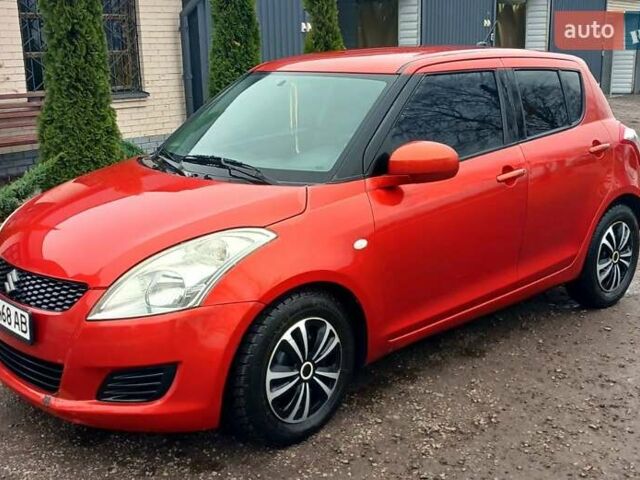 Красный Сузуки Свифт, объемом двигателя 1.24 л и пробегом 235 тыс. км за 6990 $, фото 2 на Automoto.ua