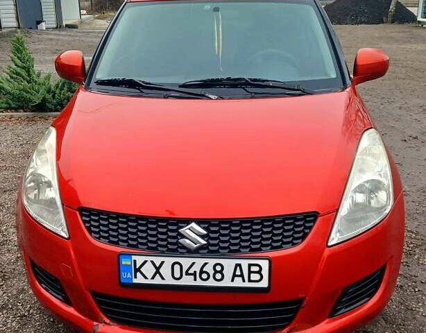 Красный Сузуки Свифт, объемом двигателя 1.24 л и пробегом 235 тыс. км за 6990 $, фото 1 на Automoto.ua