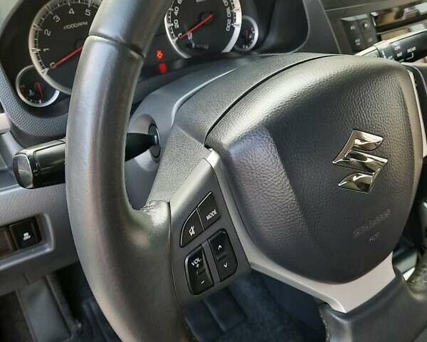 Червоний Сузукі Свифт, об'ємом двигуна 1.24 л та пробігом 70 тис. км за 9000 $, фото 17 на Automoto.ua