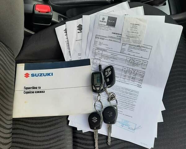 Червоний Сузукі Свифт, об'ємом двигуна 1.24 л та пробігом 70 тис. км за 9000 $, фото 29 на Automoto.ua