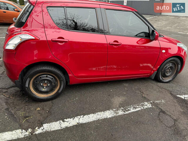 Червоний Сузукі Свифт, об'ємом двигуна 1.24 л та пробігом 140 тис. км за 7500 $, фото 3 на Automoto.ua