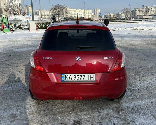 Червоний Сузукі Свифт, об'ємом двигуна 1.24 л та пробігом 145 тис. км за 8500 $, фото 5 на Automoto.ua