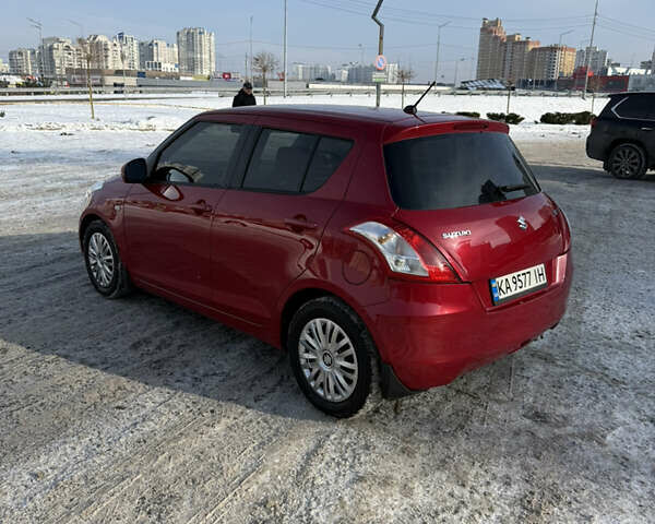 Червоний Сузукі Свифт, об'ємом двигуна 1.24 л та пробігом 145 тис. км за 8500 $, фото 6 на Automoto.ua