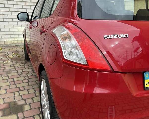Красный Сузуки Свифт, объемом двигателя 1.2 л и пробегом 77 тыс. км за 8700 $, фото 5 на Automoto.ua