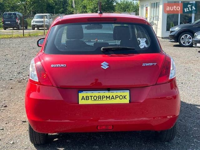 Червоний Сузукі Свифт, об'ємом двигуна 1.24 л та пробігом 146 тис. км за 9750 $, фото 4 на Automoto.ua