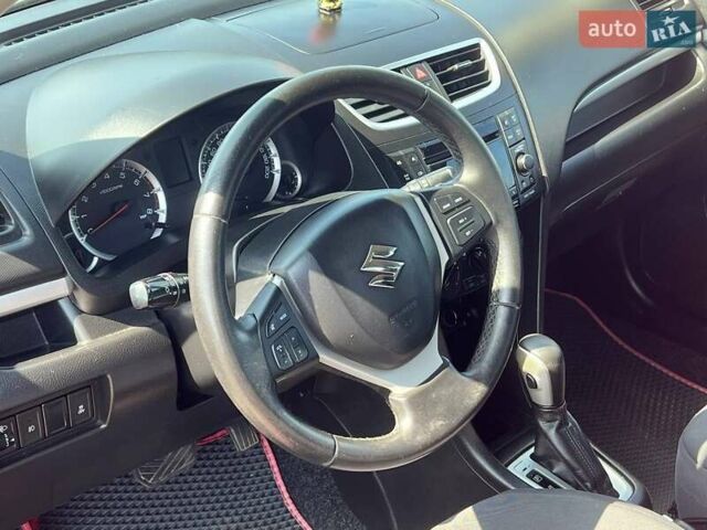 Червоний Сузукі Свифт, об'ємом двигуна 1.24 л та пробігом 146 тис. км за 9750 $, фото 9 на Automoto.ua