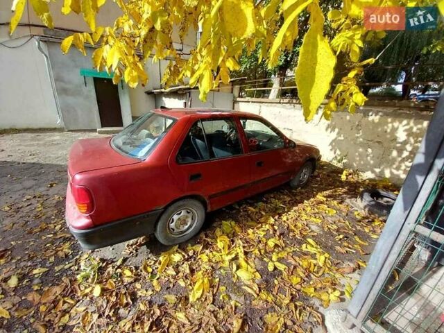 Красный Сузуки Свифт, объемом двигателя 1 л и пробегом 100 тыс. км за 450 $, фото 6 на Automoto.ua