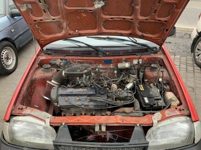 Красный Сузуки Свифт, объемом двигателя 1.6 л и пробегом 260 тыс. км за 800 $, фото 6 на Automoto.ua