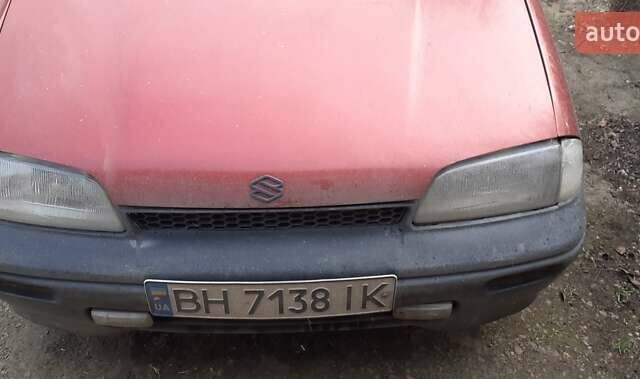 Красный Сузуки Свифт, объемом двигателя 1.3 л и пробегом 81 тыс. км за 1100 $, фото 1 на Automoto.ua