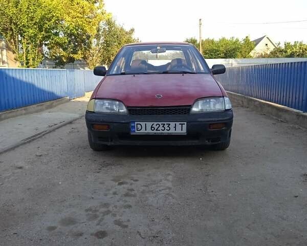 Красный Сузуки Свифт, объемом двигателя 1.3 л и пробегом 570 тыс. км за 1300 $, фото 7 на Automoto.ua