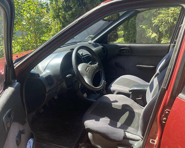 Красный Сузуки Свифт, объемом двигателя 1.3 л и пробегом 400 тыс. км за 950 $, фото 4 на Automoto.ua