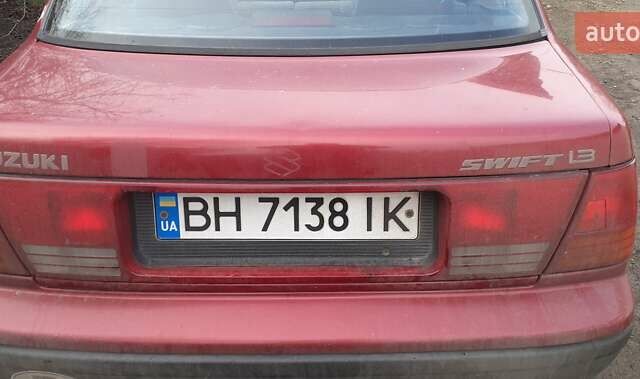 Красный Сузуки Свифт, объемом двигателя 1.3 л и пробегом 81 тыс. км за 1100 $, фото 2 на Automoto.ua