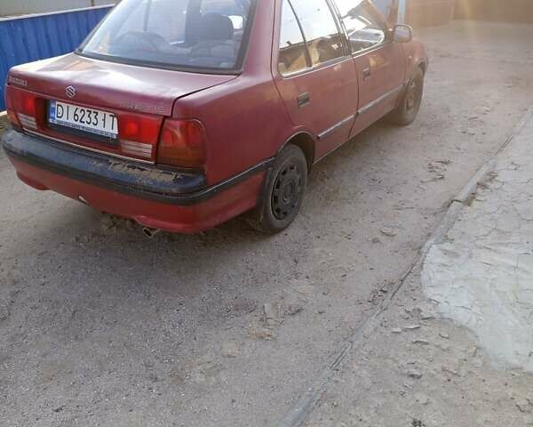 Красный Сузуки Свифт, объемом двигателя 1.3 л и пробегом 570 тыс. км за 1300 $, фото 5 на Automoto.ua