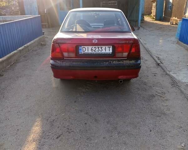 Красный Сузуки Свифт, объемом двигателя 1.3 л и пробегом 570 тыс. км за 1300 $, фото 3 на Automoto.ua