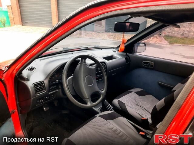 Красный Сузуки Свифт, объемом двигателя 1.3 л и пробегом 280 тыс. км за 1700 $, фото 4 на Automoto.ua