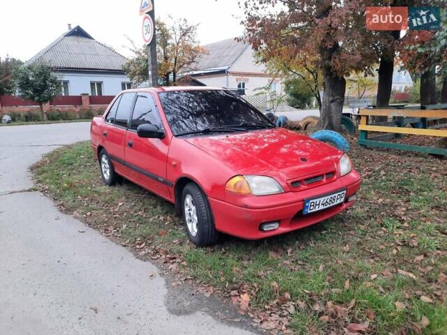 Червоний Сузукі Свифт, об'ємом двигуна 1.3 л та пробігом 280 тис. км за 1700 $, фото 7 на Automoto.ua
