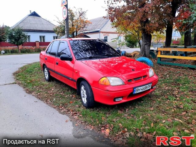 Красный Сузуки Свифт, объемом двигателя 1.3 л и пробегом 280 тыс. км за 1700 $, фото 3 на Automoto.ua