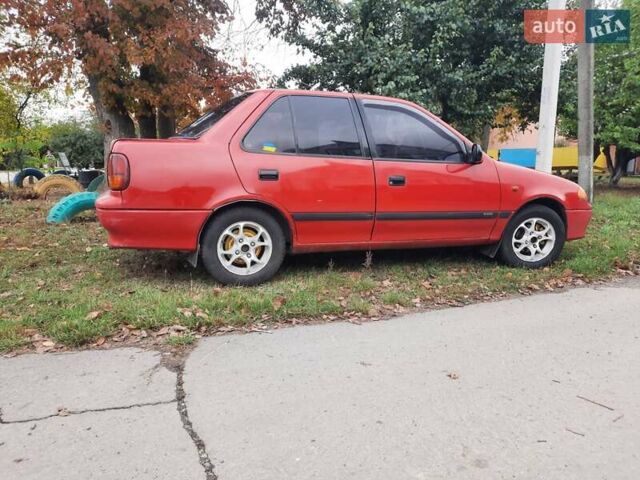 Червоний Сузукі Свифт, об'ємом двигуна 1.3 л та пробігом 280 тис. км за 1700 $, фото 2 на Automoto.ua