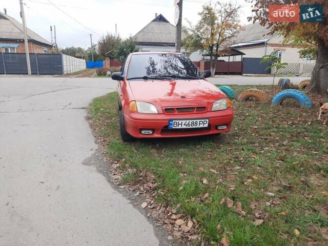 Червоний Сузукі Свифт, об'ємом двигуна 1.3 л та пробігом 280 тис. км за 1700 $, фото 3 на Automoto.ua