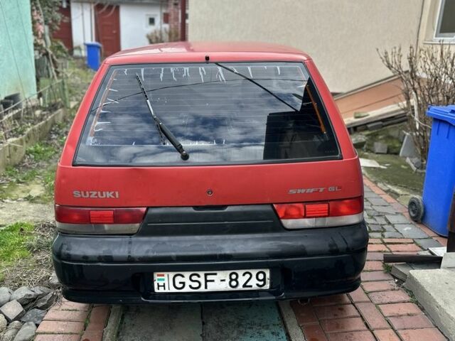 Красный Сузуки Свифт, объемом двигателя 1 л и пробегом 155 тыс. км за 750 $, фото 5 на Automoto.ua