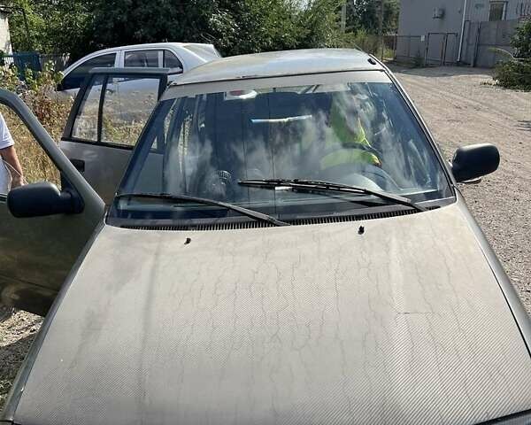 Сірий Сузукі Свифт, об'ємом двигуна 1.3 л та пробігом 220 тис. км за 680 $, фото 1 на Automoto.ua