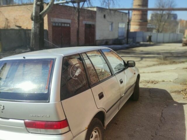 Серый Сузуки Свифт, объемом двигателя 1.3 л и пробегом 154 тыс. км за 960 $, фото 3 на Automoto.ua