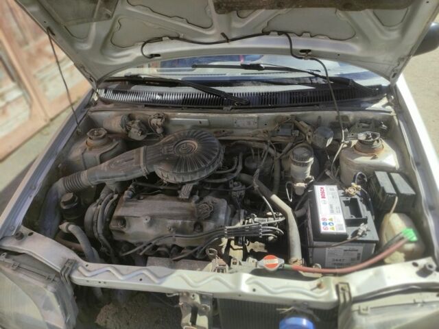 Серый Сузуки Свифт, объемом двигателя 1.3 л и пробегом 154 тыс. км за 960 $, фото 4 на Automoto.ua