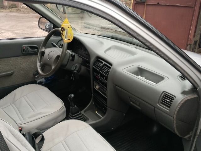 Серый Сузуки Свифт, объемом двигателя 1.3 л и пробегом 350 тыс. км за 1000 $, фото 8 на Automoto.ua