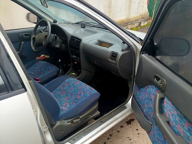 Серый Сузуки Свифт, объемом двигателя 1.3 л и пробегом 196 тыс. км за 1900 $, фото 4 на Automoto.ua