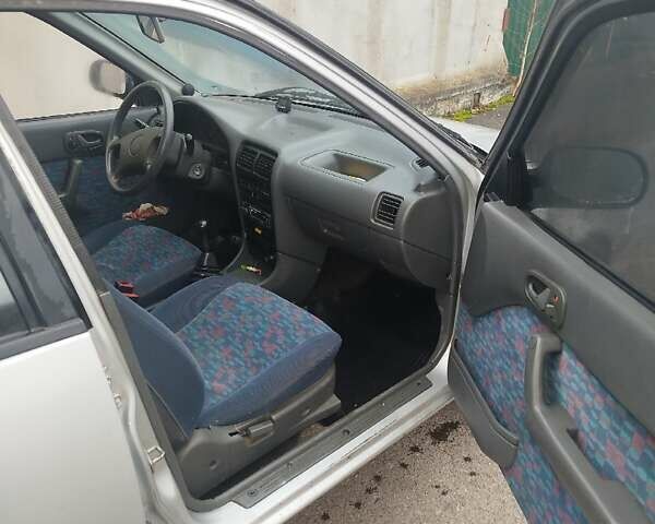 Серый Сузуки Свифт, объемом двигателя 1.3 л и пробегом 196 тыс. км за 1900 $, фото 14 на Automoto.ua