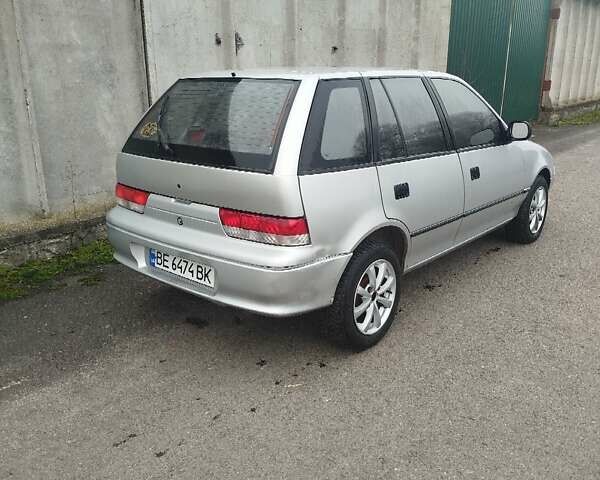 Серый Сузуки Свифт, объемом двигателя 1.3 л и пробегом 196 тыс. км за 1900 $, фото 2 на Automoto.ua