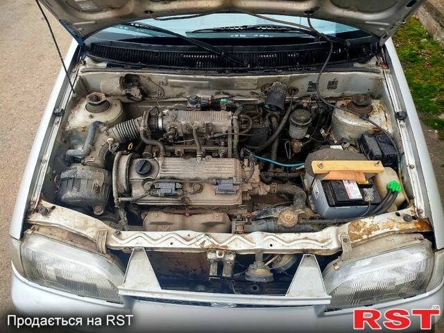 Серый Сузуки Свифт, объемом двигателя 1.3 л и пробегом 196 тыс. км за 1900 $, фото 8 на Automoto.ua