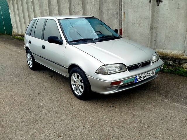 Серый Сузуки Свифт, объемом двигателя 1.3 л и пробегом 196 тыс. км за 1900 $, фото 1 на Automoto.ua