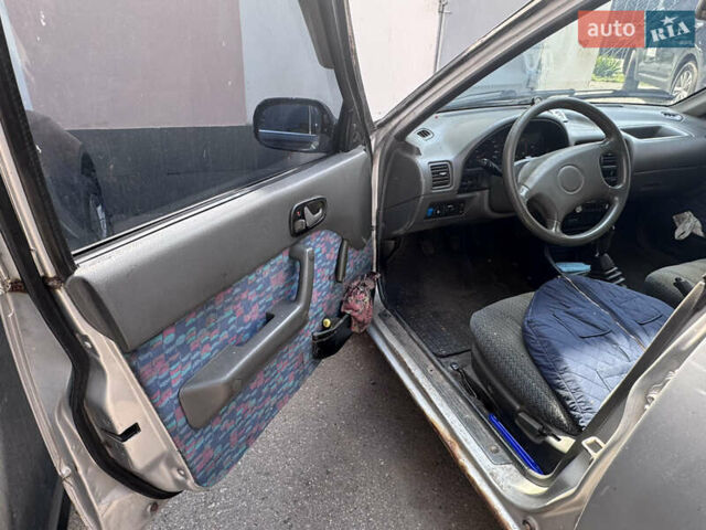 Серый Сузуки Свифт, объемом двигателя 1.3 л и пробегом 260 тыс. км за 1600 $, фото 7 на Automoto.ua