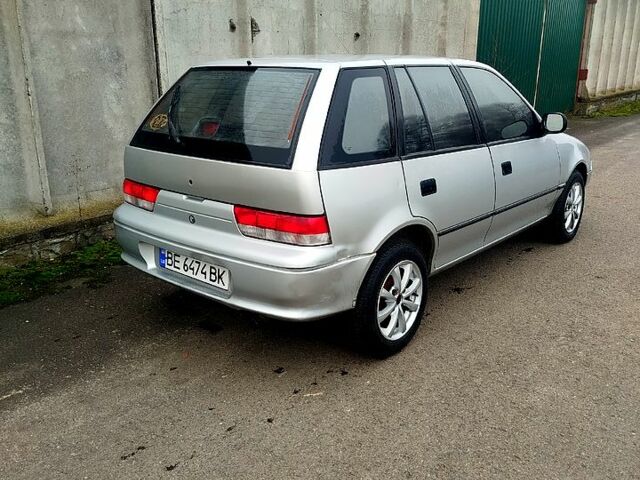 Серый Сузуки Свифт, объемом двигателя 1.3 л и пробегом 196 тыс. км за 1900 $, фото 2 на Automoto.ua