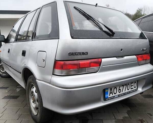 Серый Сузуки Свифт, объемом двигателя 1.3 л и пробегом 56 тыс. км за 2550 $, фото 1 на Automoto.ua