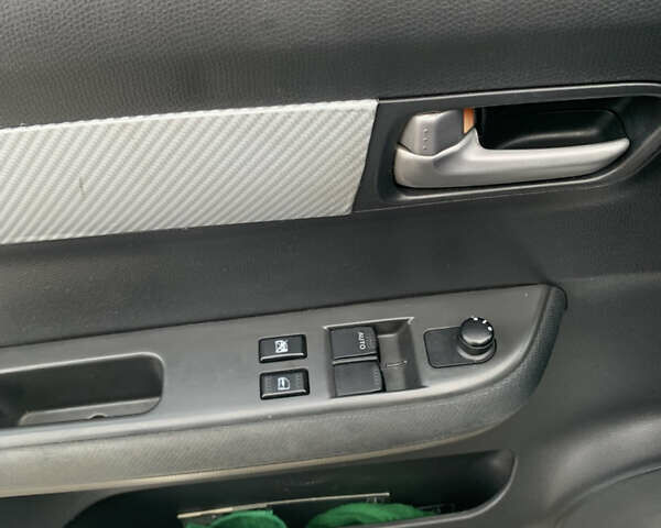 Сірий Сузукі Свифт, об'ємом двигуна 1.3 л та пробігом 229 тис. км за 4250 $, фото 25 на Automoto.ua