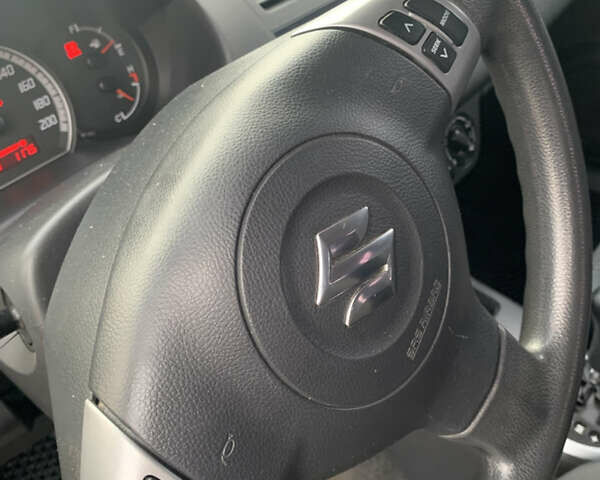 Сірий Сузукі Свифт, об'ємом двигуна 1.3 л та пробігом 229 тис. км за 4250 $, фото 23 на Automoto.ua