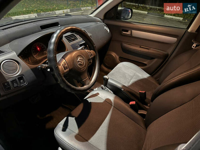 Серый Сузуки Свифт, объемом двигателя 1.33 л и пробегом 181 тыс. км за 3999 $, фото 4 на Automoto.ua