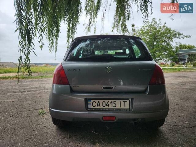Сірий Сузукі Свифт, об'ємом двигуна 1.49 л та пробігом 192 тис. км за 5400 $, фото 3 на Automoto.ua