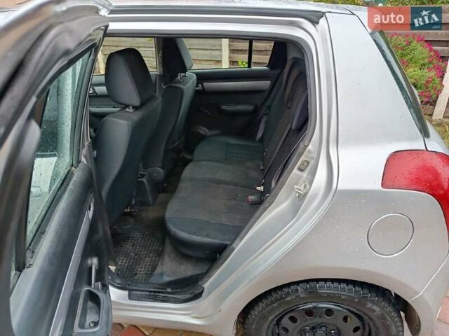 Сірий Сузукі Свифт, об'ємом двигуна 1.33 л та пробігом 150 тис. км за 2999 $, фото 6 на Automoto.ua