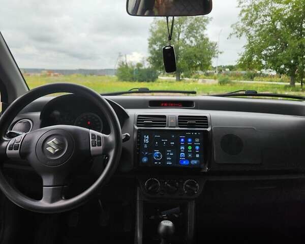 Сірий Сузукі Свифт, об'ємом двигуна 1.49 л та пробігом 192 тис. км за 5400 $, фото 8 на Automoto.ua